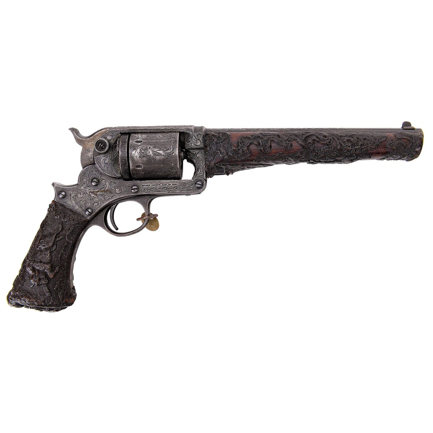 The second revolver, engraved, with carved grips